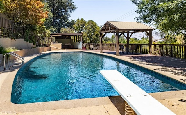 1653 W Cypress Ave, Redlands, CA 92373 - view of pool with a gazebo, a diving board, and an outdoor living space