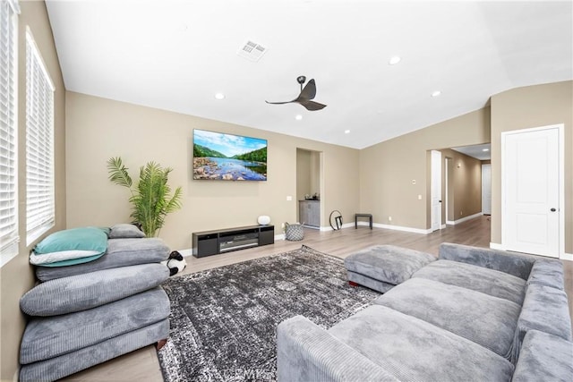 27741 Solitude Ave, Moreno Valley, CA 92555 - living room with wood finished floors, ceiling fan, lofted ceiling, and recessed lighting