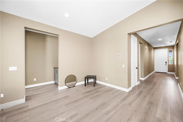 27741 Solitude Ave, Moreno Valley, CA 92555 - unfurnished room with light wood-style flooring and recessed lighting