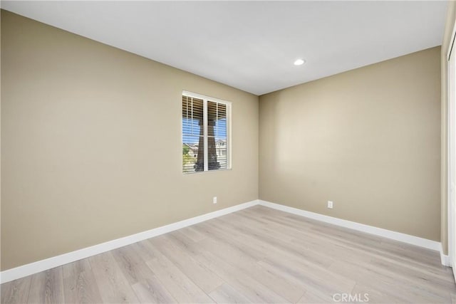 27741 Solitude Ave, Moreno Valley, CA 92555 - empty room with light wood-style floors and recessed lighting