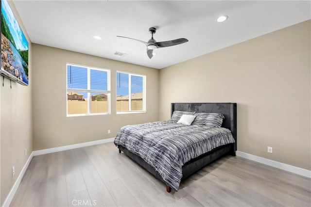 27741 Solitude Ave, Moreno Valley, CA 92555 - bedroom with wood finished floors, recessed lighting, and ceiling fan
