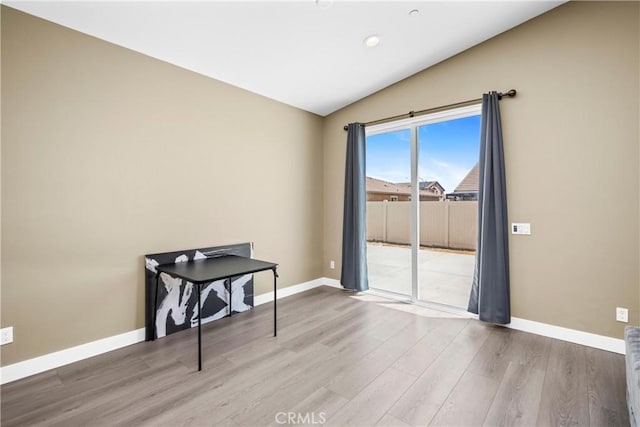 27741 Solitude Ave, Moreno Valley, CA 92555 - unfurnished room featuring vaulted ceiling, wood finished floors, and recessed lighting