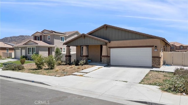 27741 Solitude Ave, Moreno Valley, CA 92555 - craftsman house featuring a garage, concrete driveway, and stucco siding