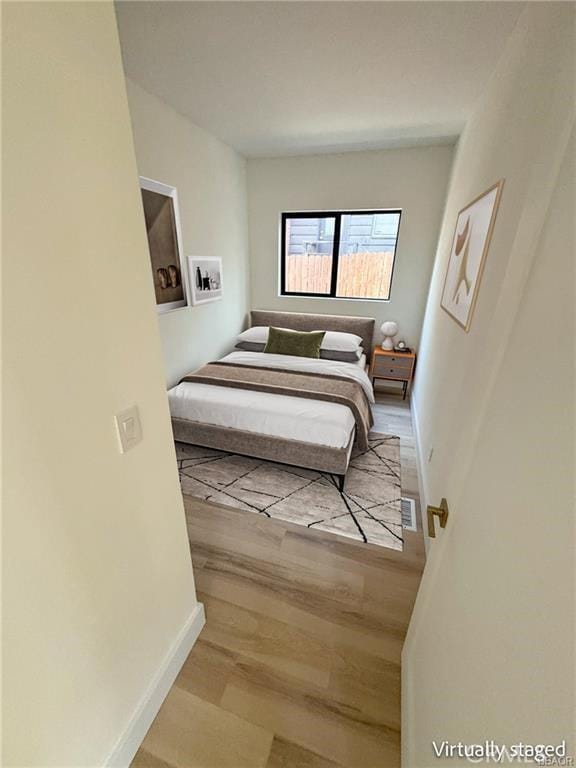 216 Leonard Ln, Big Bear, CA 92386 - bedroom featuring wood finished floors and baseboards