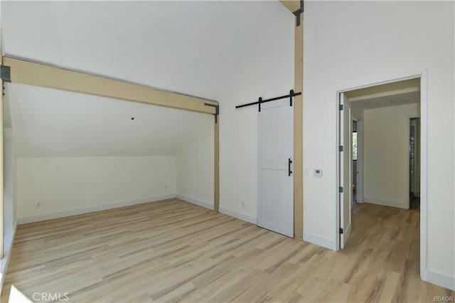 216 Leonard Ln, Big Bear, CA 92386 - bonus room featuring a barn door and light wood-type flooring