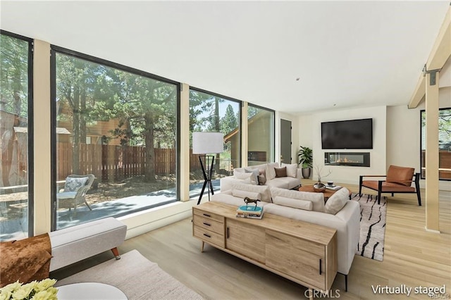 216 Leonard Ln, Big Bear, CA 92386 - living area featuring wood finished floors and expansive windows