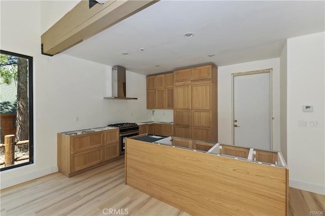 216 Leonard Ln, Big Bear, CA 92386 - kitchen with wall chimney exhaust hood, gas range, light wood-type flooring, and recessed lighting