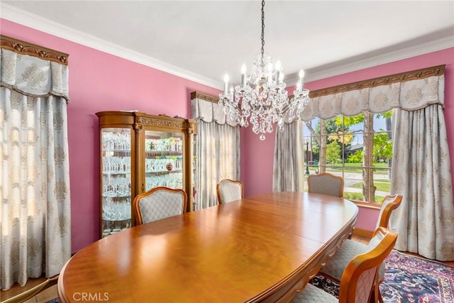 1811 N Flower St, Santa Ana, CA 92706 - dining area featuring crown molding and a chandelier