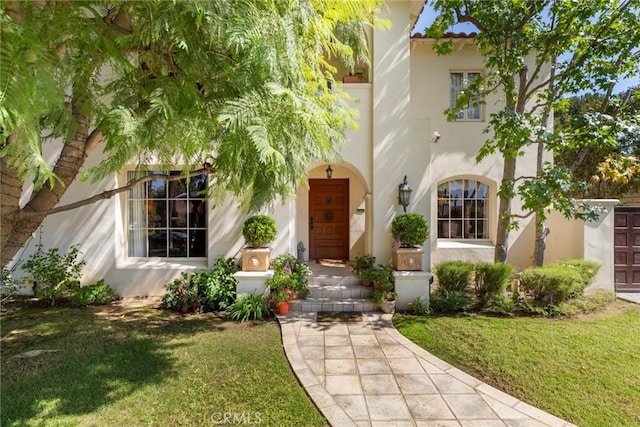 1811 N Flower St, Santa Ana, CA 92706 - view of front of property with stucco siding and a front lawn