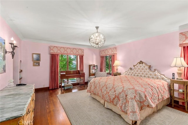 1811 N Flower St, Santa Ana, CA 92706 - bedroom with a chandelier, wood finished floors, and crown molding