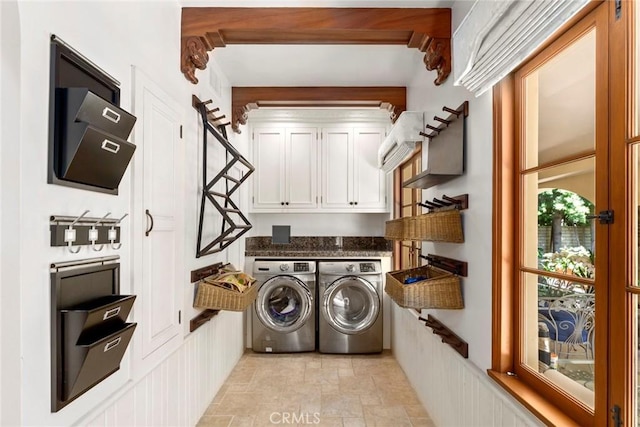 1811 N Flower St, Santa Ana, CA 92706 - laundry room with cabinet space, independent washer and dryer, and stone finish flooring