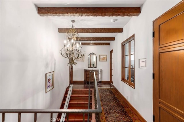 1811 N Flower St, Santa Ana, CA 92706 - corridor featuring a chandelier, beam ceiling, and dark wood-style floors