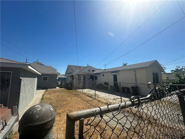 1409 E 41st Pl, Los Angeles, CA 90011 - rear view of house featuring a residential view