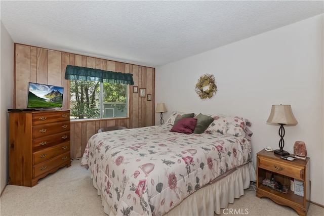 325 Brentwood, Lake Arrowhead, CA 92352 - bedroom with light carpet, a textured ceiling, and wooden walls