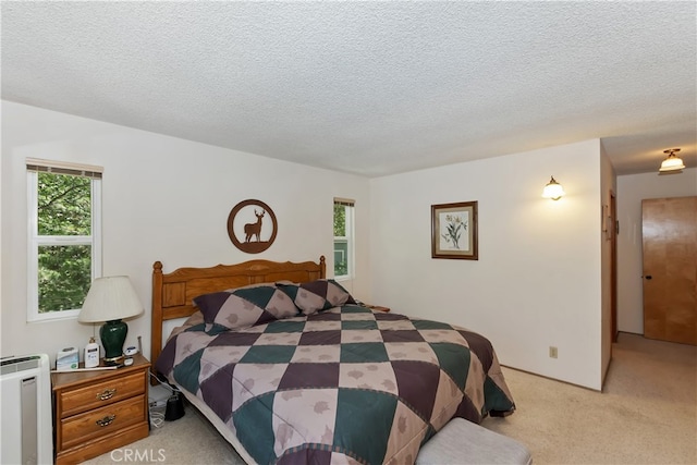 325 Brentwood, Lake Arrowhead, CA 92352 - bedroom featuring light colored carpet and a textured ceiling