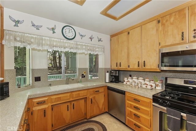 325 Brentwood, Lake Arrowhead, CA 92352 - kitchen featuring stainless steel appliances, light countertops, backsplash, and light tile patterned floors