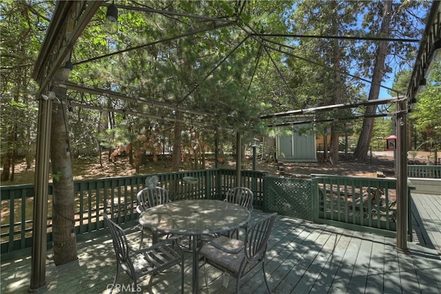 325 Brentwood, Lake Arrowhead, CA 92352 - wooden deck featuring outdoor dining area