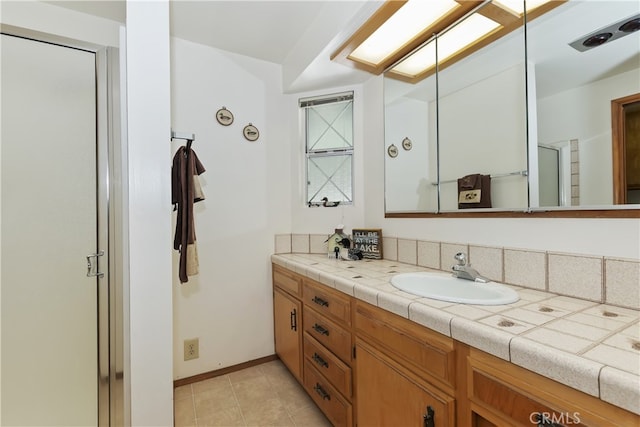 325 Brentwood, Lake Arrowhead, CA 92352 - bathroom featuring vanity, tile patterned floors, and a shower with shower door