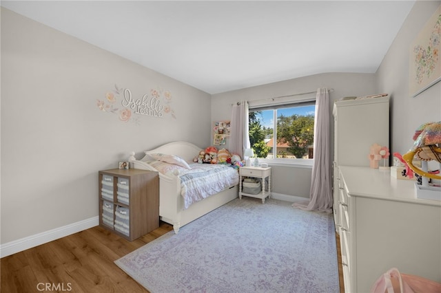 1051 Russell St, La Habra, CA 90631 - bedroom featuring light wood finished floors and lofted ceiling