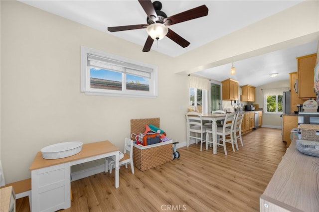 1051 Russell St, La Habra, CA 90631 - dining room featuring light wood-style floors, a ceiling fan, and lofted ceiling