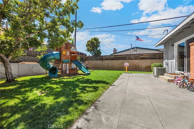1051 Russell St, La Habra, CA 90631 - fenced backyard featuring a playground and a patio area