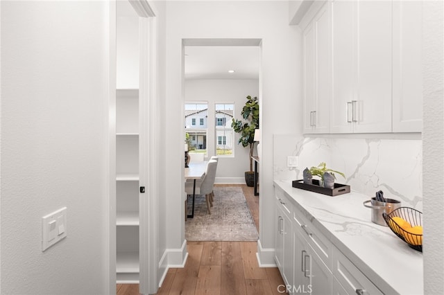 13428 Silver Sky Rd, Rancho Cucamonga, CA 91739 - hallway with wood finished floors and baseboards