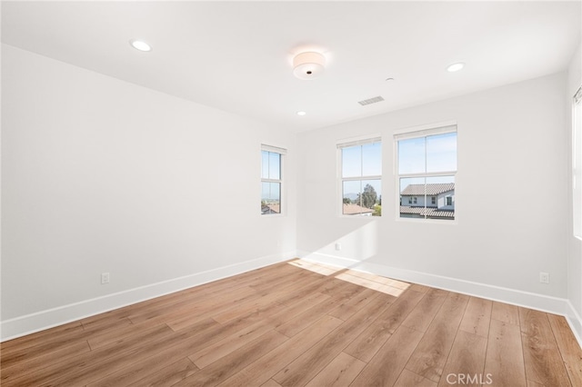 13428 Silver Sky Rd, Rancho Cucamonga, CA 91739 - empty room with light wood-style floors and recessed lighting