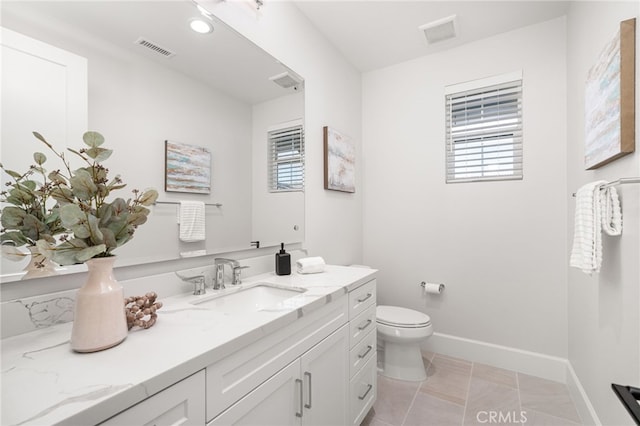13428 Silver Sky Rd, Rancho Cucamonga, CA 91739 - bathroom with vanity, healthy amount of natural light, and tile patterned flooring