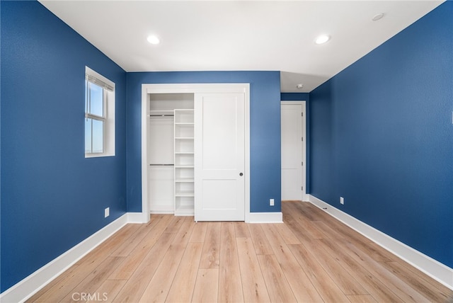 13428 Silver Sky Rd, Rancho Cucamonga, CA 91739 - unfurnished bedroom with light wood finished floors, a closet, and recessed lighting