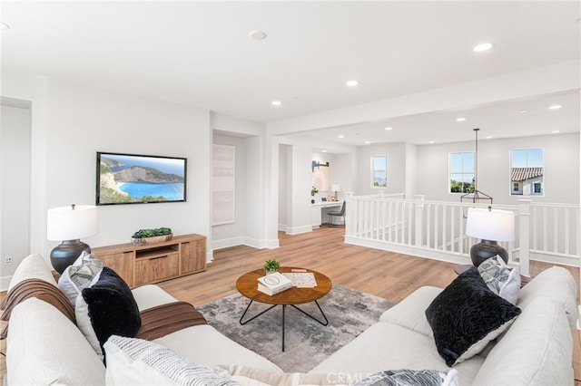 13428 Silver Sky Rd, Rancho Cucamonga, CA 91739 - living area featuring light wood finished floors and recessed lighting