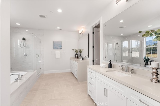 13428 Silver Sky Rd, Rancho Cucamonga, CA 91739 - bathroom with recessed lighting, vanity, a marble finish shower, and a garden tub