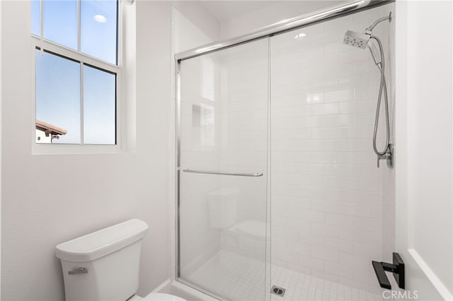 13428 Silver Sky Rd, Rancho Cucamonga, CA 91739 - full bathroom with a stall shower and toilet