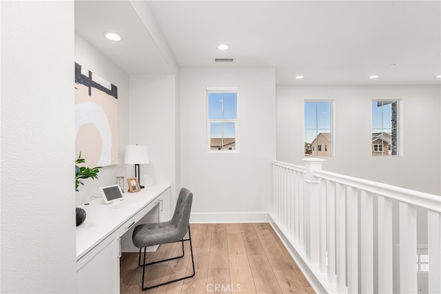 13428 Silver Sky Rd, Rancho Cucamonga, CA 91739 - office space featuring built in desk, recessed lighting, light wood-style floors, and plenty of natural light