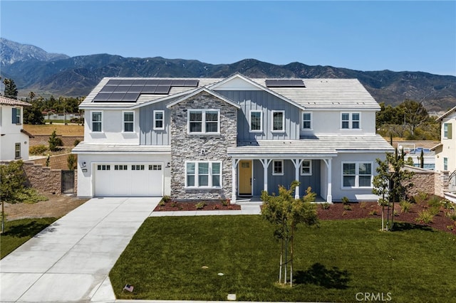 13428 Silver Sky Rd, Rancho Cucamonga, CA 91739 - traditional-style house featuring board and batten siding, a garage, a mountain view, and concrete driveway