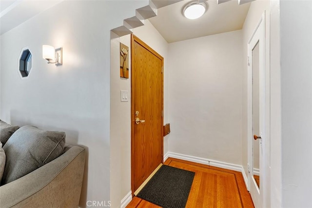2118 W 84th St, Los Angeles, CA 90047 - doorway featuring wood finished floors and baseboards