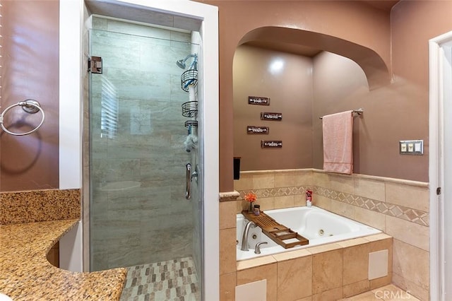 2118 W 84th St, Los Angeles, CA 90047 - bathroom featuring a stall shower and a whirlpool tub