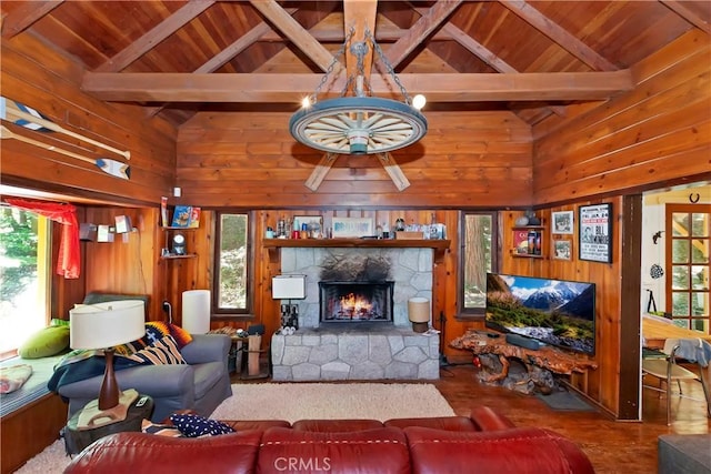 714 Blue Jay Canyon Rd, Lake Arrowhead, CA 92317 - living area with wood ceiling, a stone fireplace, wood walls, and wood finished floors