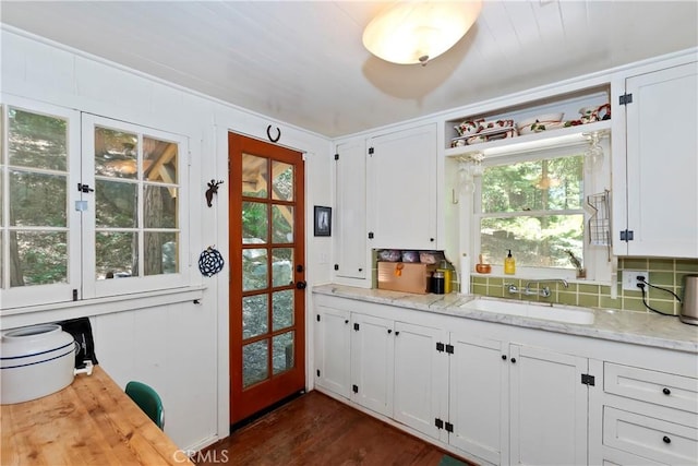 714 Blue Jay Canyon Rd, Lake Arrowhead, CA 92317 - kitchen with backsplash, white cabinets, dark wood finished floors, light stone countertops, and open shelves
