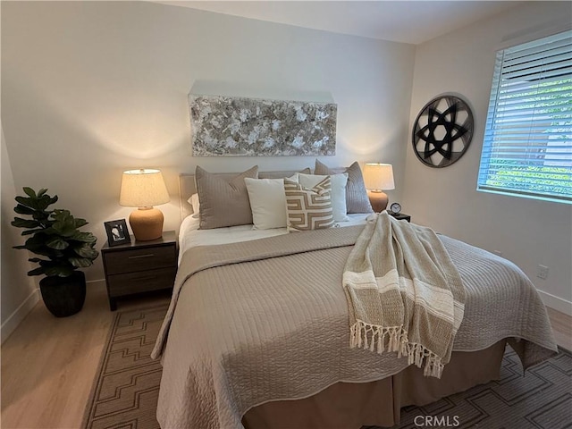 13 Silvertide Dr, Dana Point, CA 92629 - bedroom with wood finished floors and baseboards