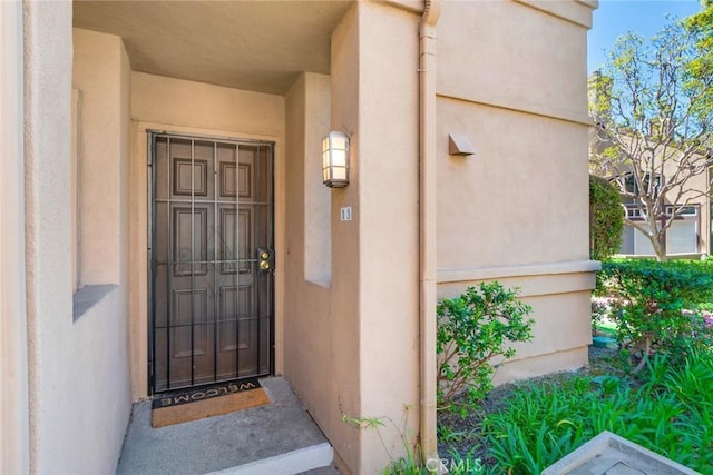 13 Silvertide Dr, Dana Point, CA 92629 - view of exterior entry featuring stucco siding