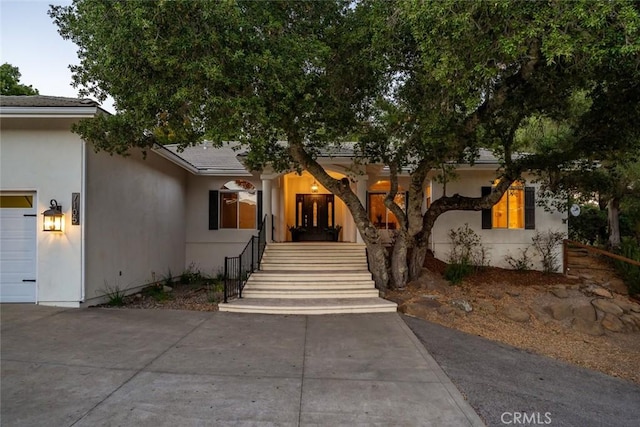 7105 Rayar Rd, Atascadero, CA 93422 - view of front facade with an attached garage and stucco siding