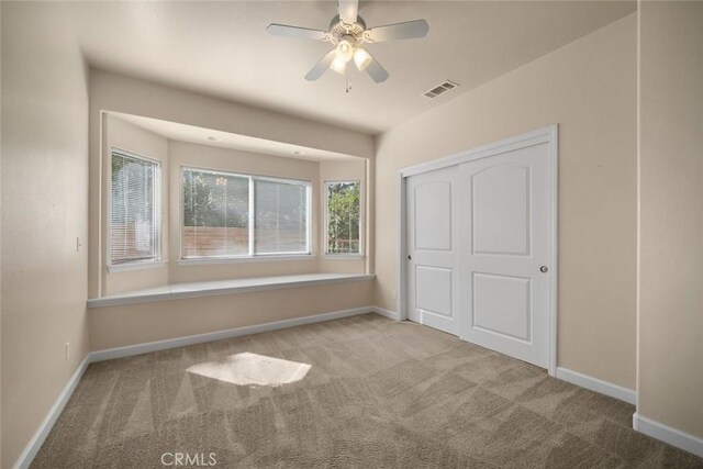 7105 Rayar Rd, Atascadero, CA 93422 - unfurnished bedroom featuring carpet floors, a closet, and ceiling fan
