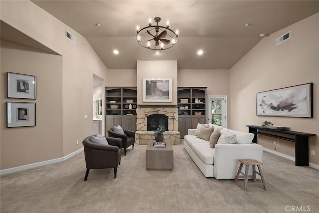 7105 Rayar Rd, Atascadero, CA 93422 - living room with a chandelier, light colored carpet, vaulted ceiling, a fireplace, and recessed lighting