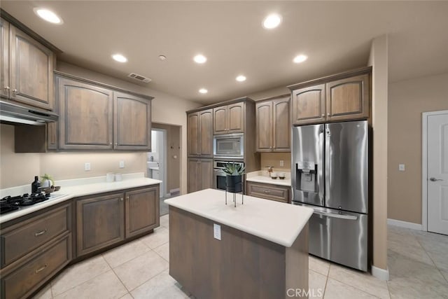 7105 Rayar Rd, Atascadero, CA 93422 - kitchen featuring stainless steel appliances, ventilation hood, recessed lighting, a center island, and light countertops