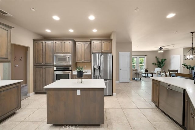 7105 Rayar Rd, Atascadero, CA 93422 - kitchen featuring appliances with stainless steel finishes, recessed lighting, light tile patterned floors, light countertops, and a ceiling fan