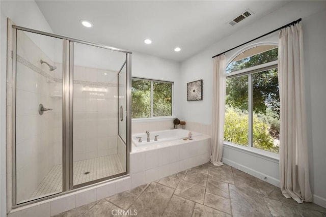 7105 Rayar Rd, Atascadero, CA 93422 - bathroom featuring a bath, a shower stall, and recessed lighting