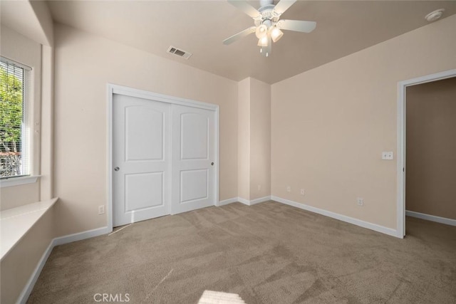 7105 Rayar Rd, Atascadero, CA 93422 - unfurnished bedroom with carpet floors, a closet, and a ceiling fan
