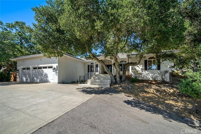 7105 Rayar Rd, Atascadero, CA 93422 - view of front of property with concrete driveway, stucco siding, and an attached garage