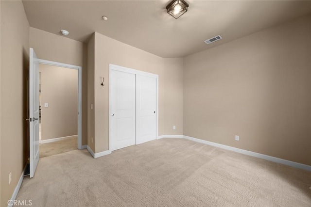 7105 Rayar Rd, Atascadero, CA 93422 - unfurnished bedroom with light colored carpet and a closet