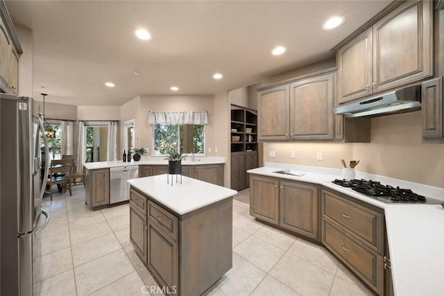 7105 Rayar Rd, Atascadero, CA 93422 - kitchen featuring appliances with stainless steel finishes, under cabinet range hood, a center island, recessed lighting, and light countertops